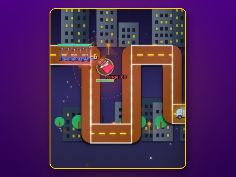 A winding road through a night-time city in Van Defense